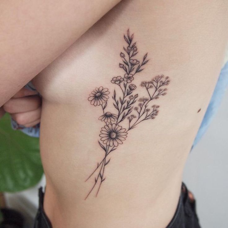 Adorable Floral Tattoo.