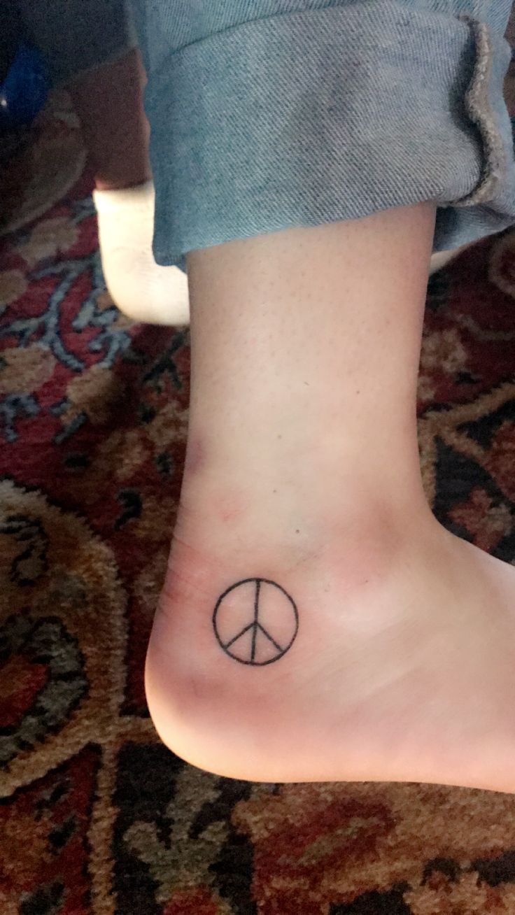 51 Cool Peace Sign Tattoo Photos