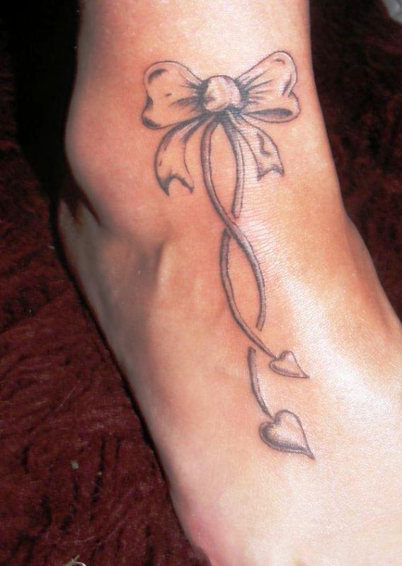 40 Incredible Bow Foot Tattoo Pictures