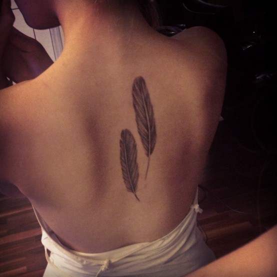 42 Best Feather Back Tattoo Pics